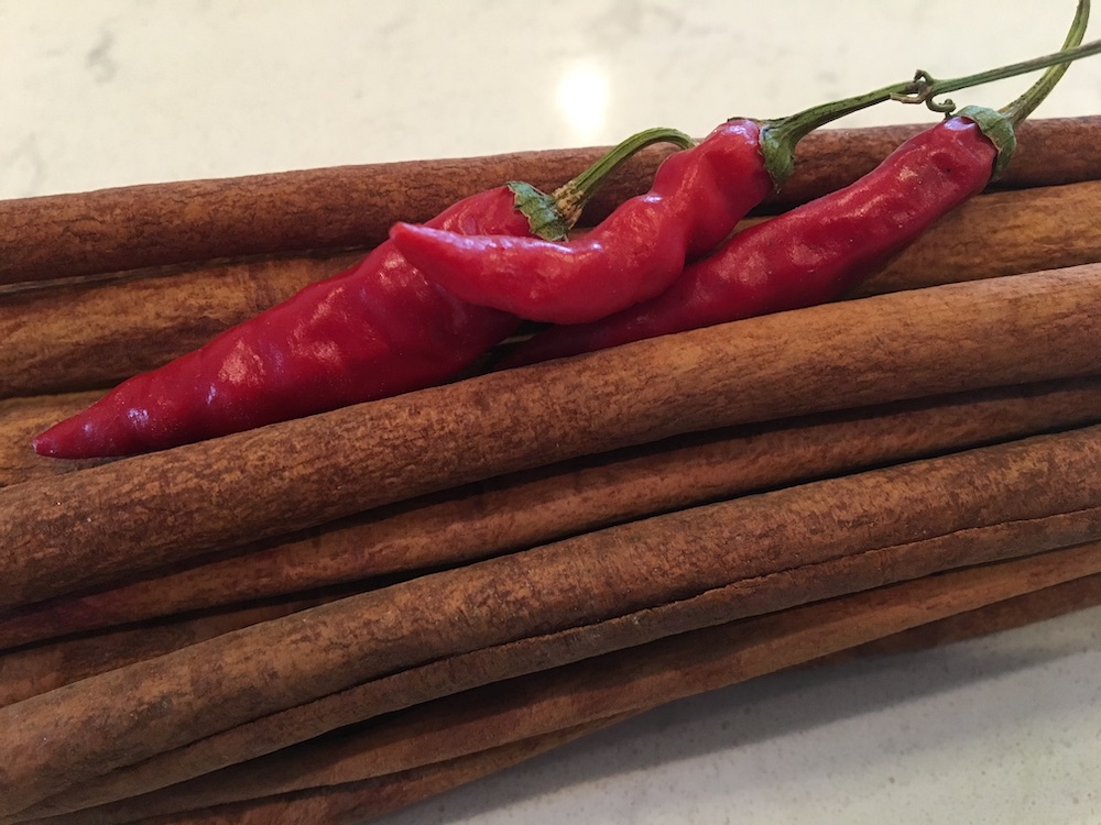 Cinnamon sticks and chilis